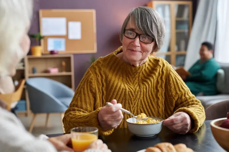 Senior woman talking to a friend