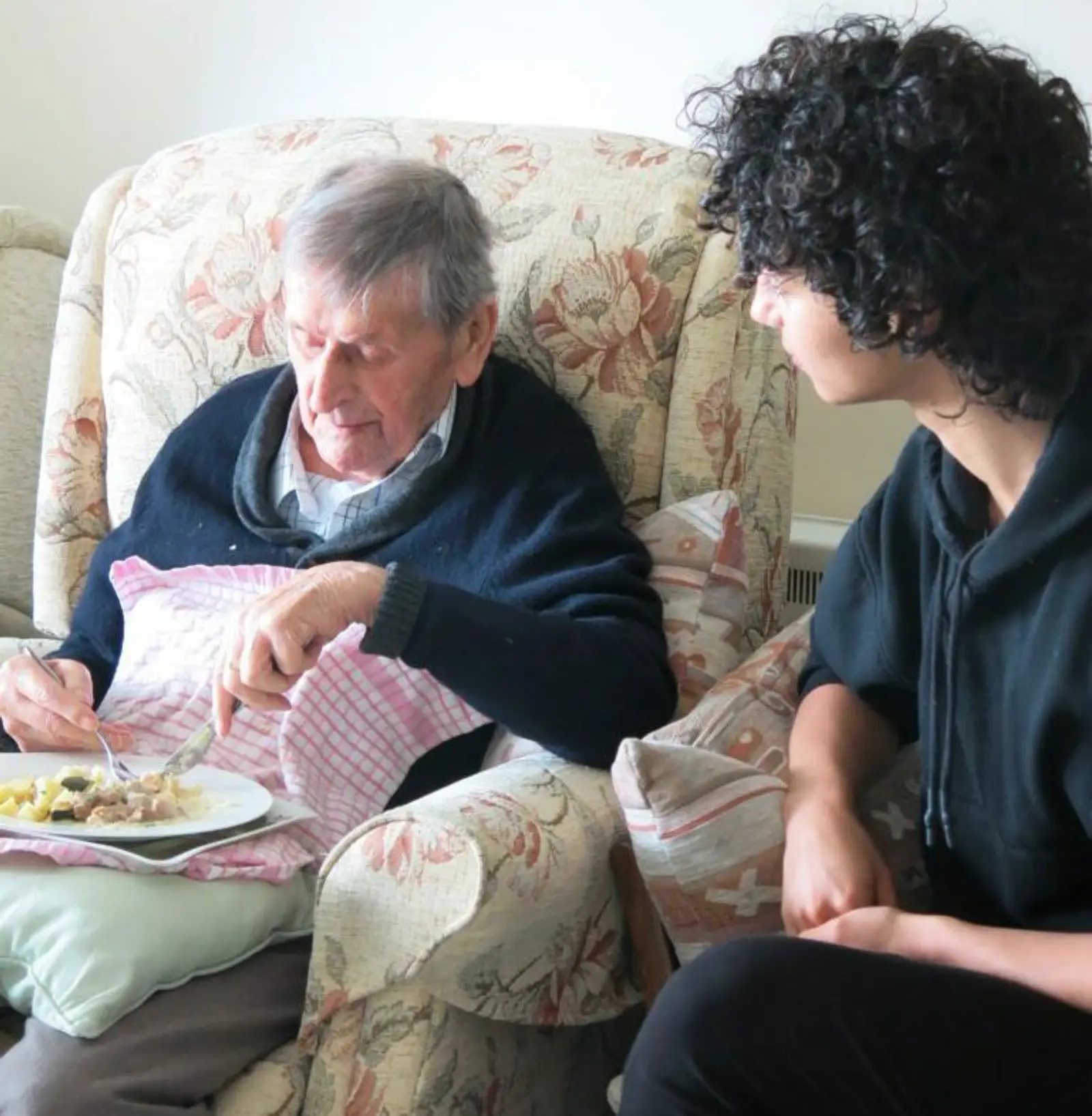 Freddy with carer Maria