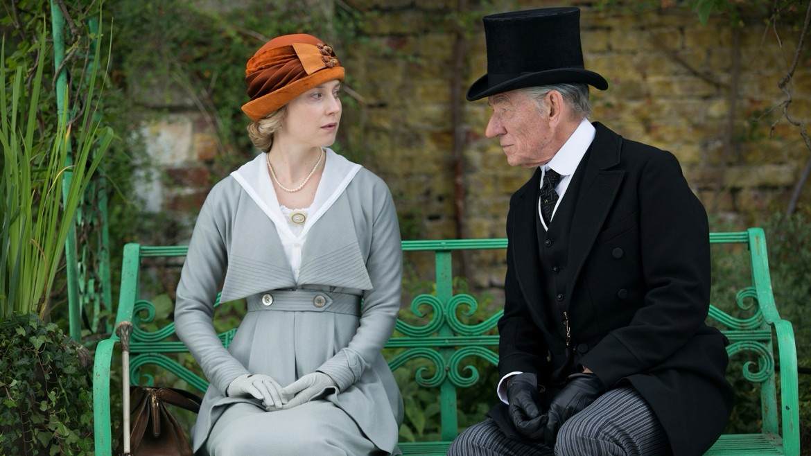 An elderly Sherlock Holmes, struggling with memory loss, recalls a past case on a garden bench in Mr Holmes (2015)