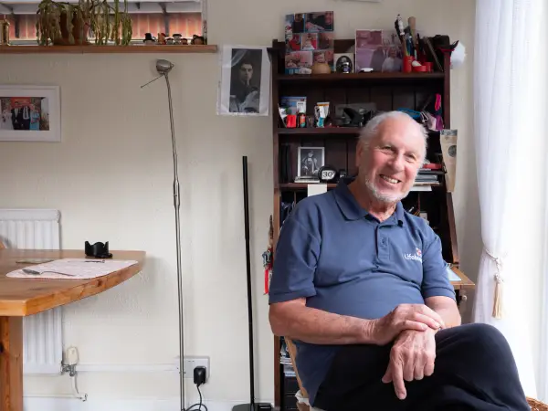 Elderly man sitting at home