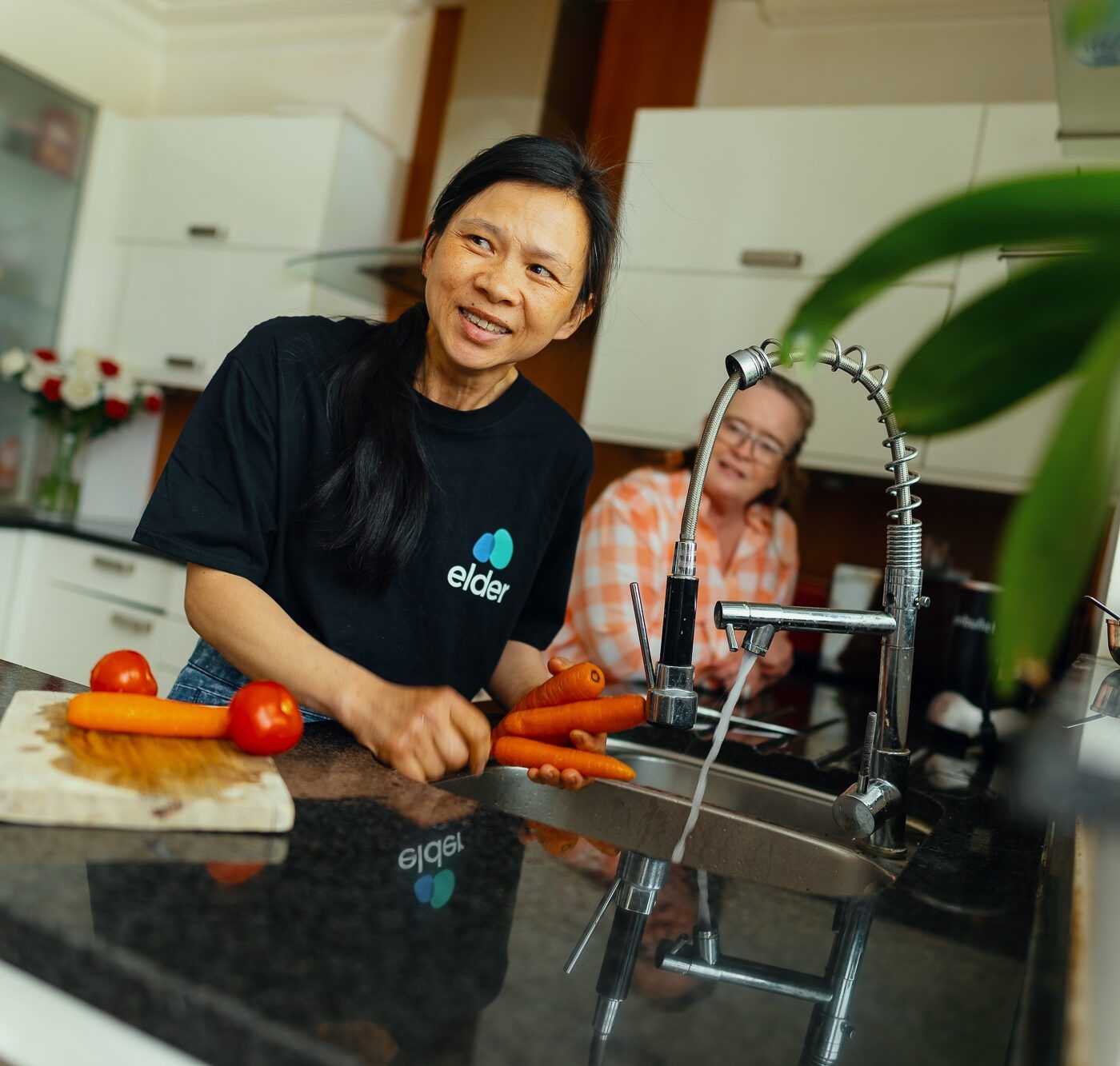 Carer preparing dinner