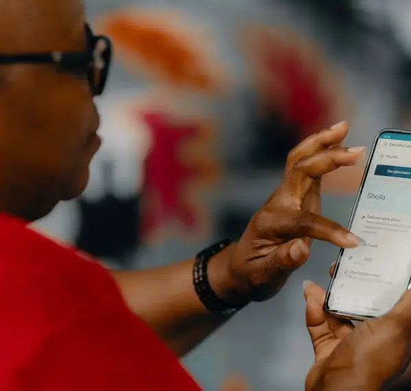 Carer using MyElder on her phone