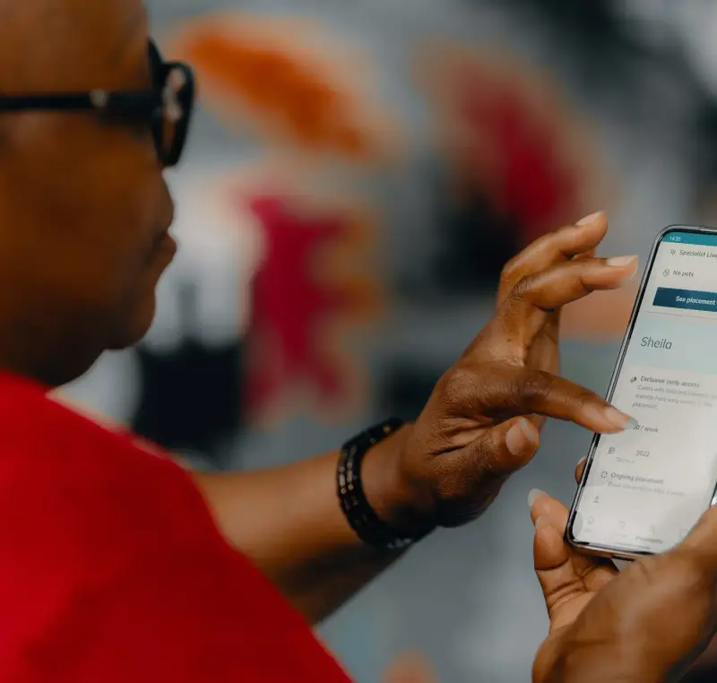 Customer using My Elder on phone