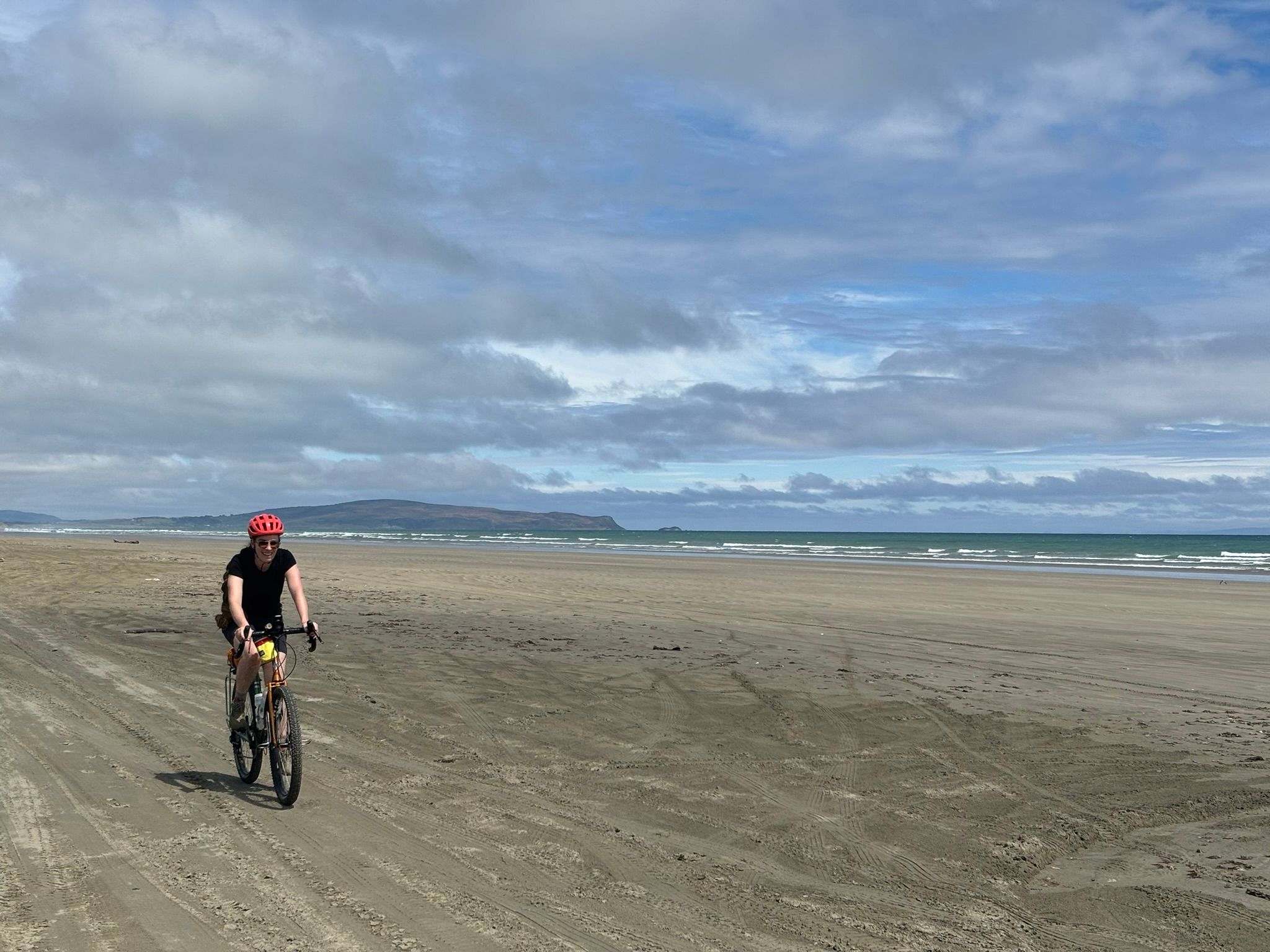 Casually cycling along the beach