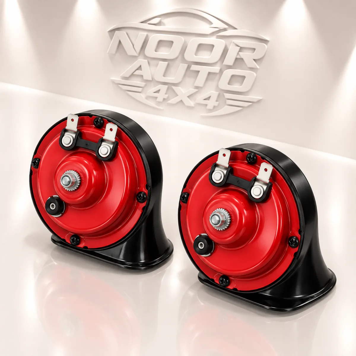 Imported red and black snail car horn pair with mounting brackets and spade terminals