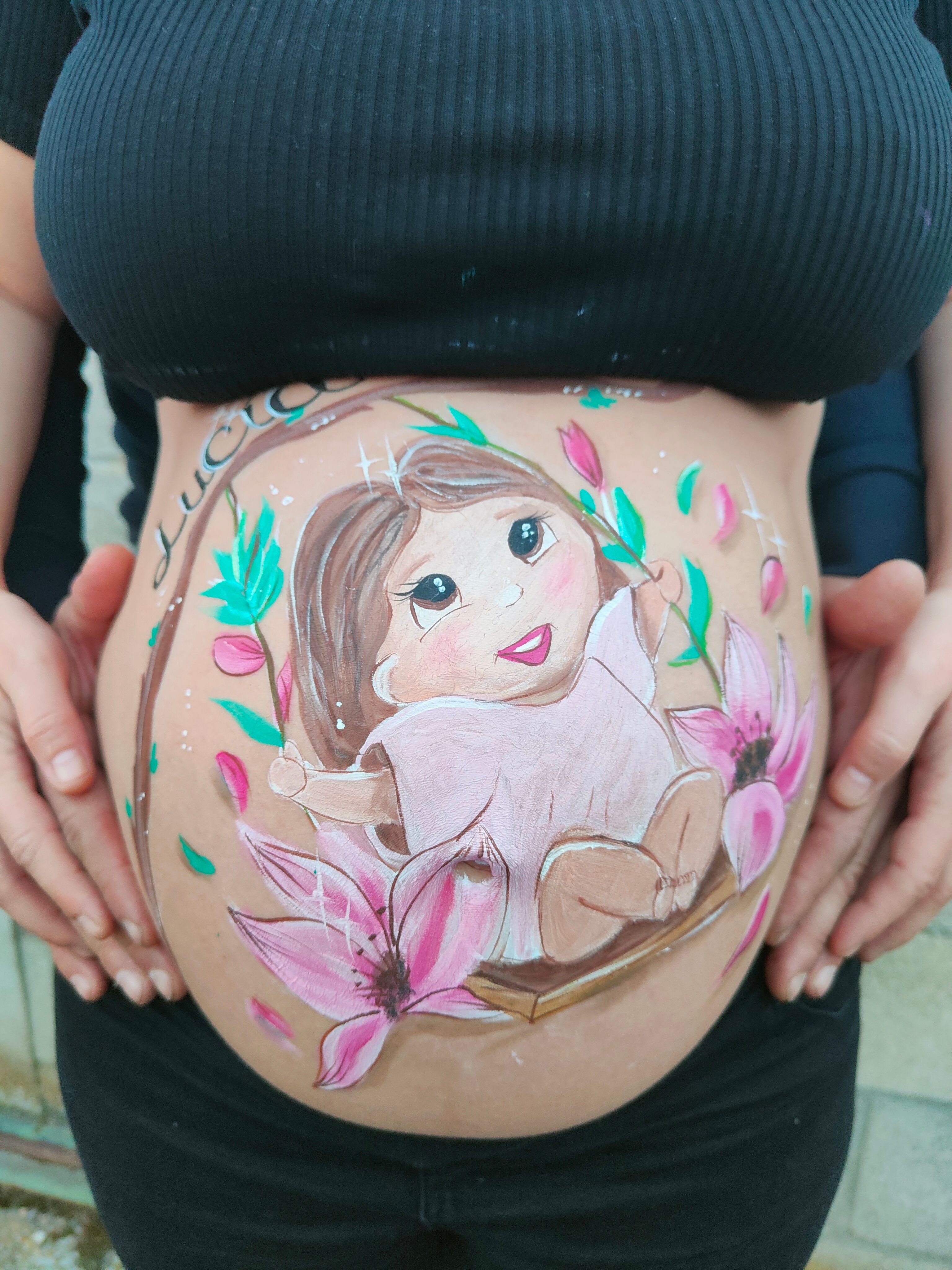 Bellypainting niña en columpio 