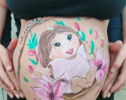 Bellypainting niña en columpio