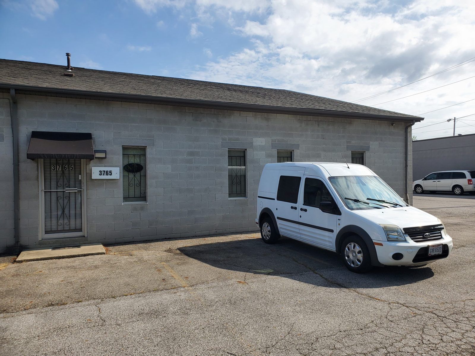 Front of our Columbus shop with the service van parked outside at Speedy Underhood Service in Columbus, Ohio