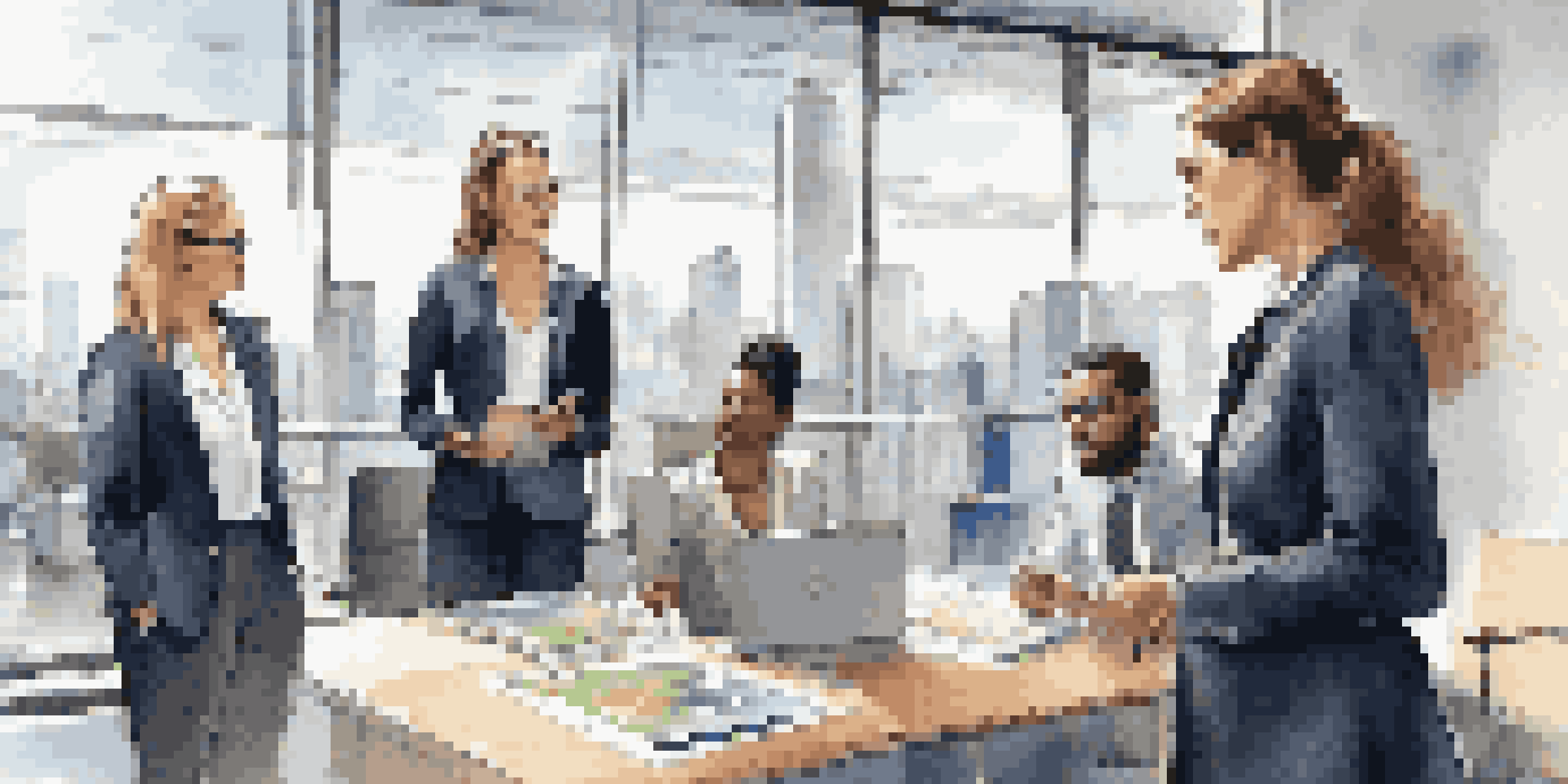 A confident young woman in a modern office discussing a project with her colleagues, with a city skyline visible through large windows.