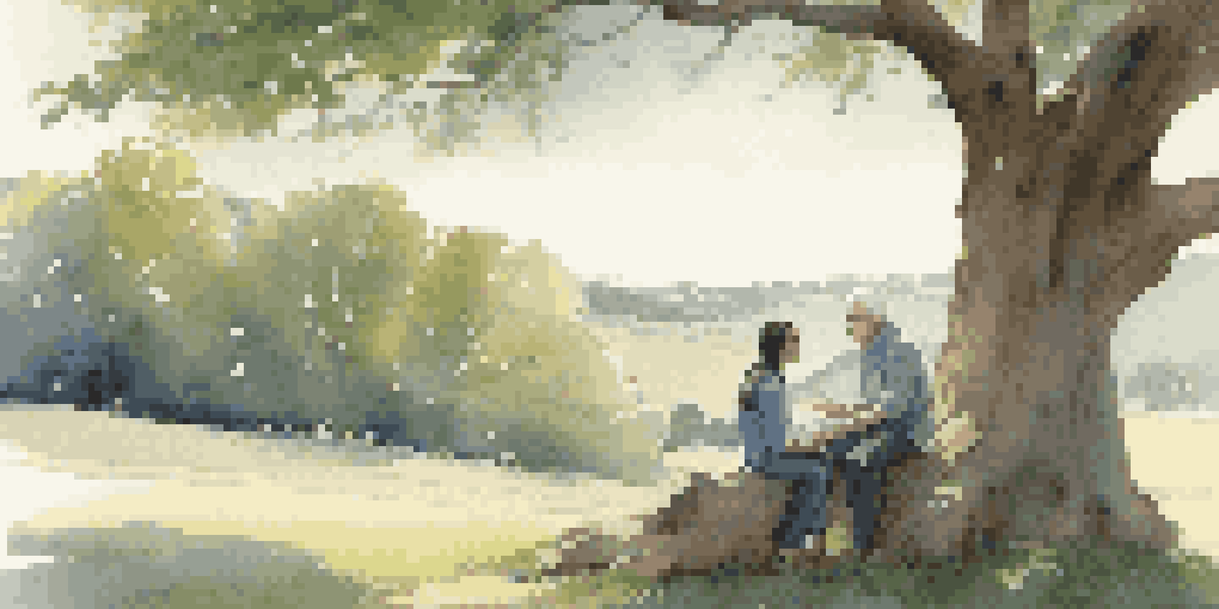 A mentor and mentee having a conversation under an oak tree, with sunlight filtering through the leaves.