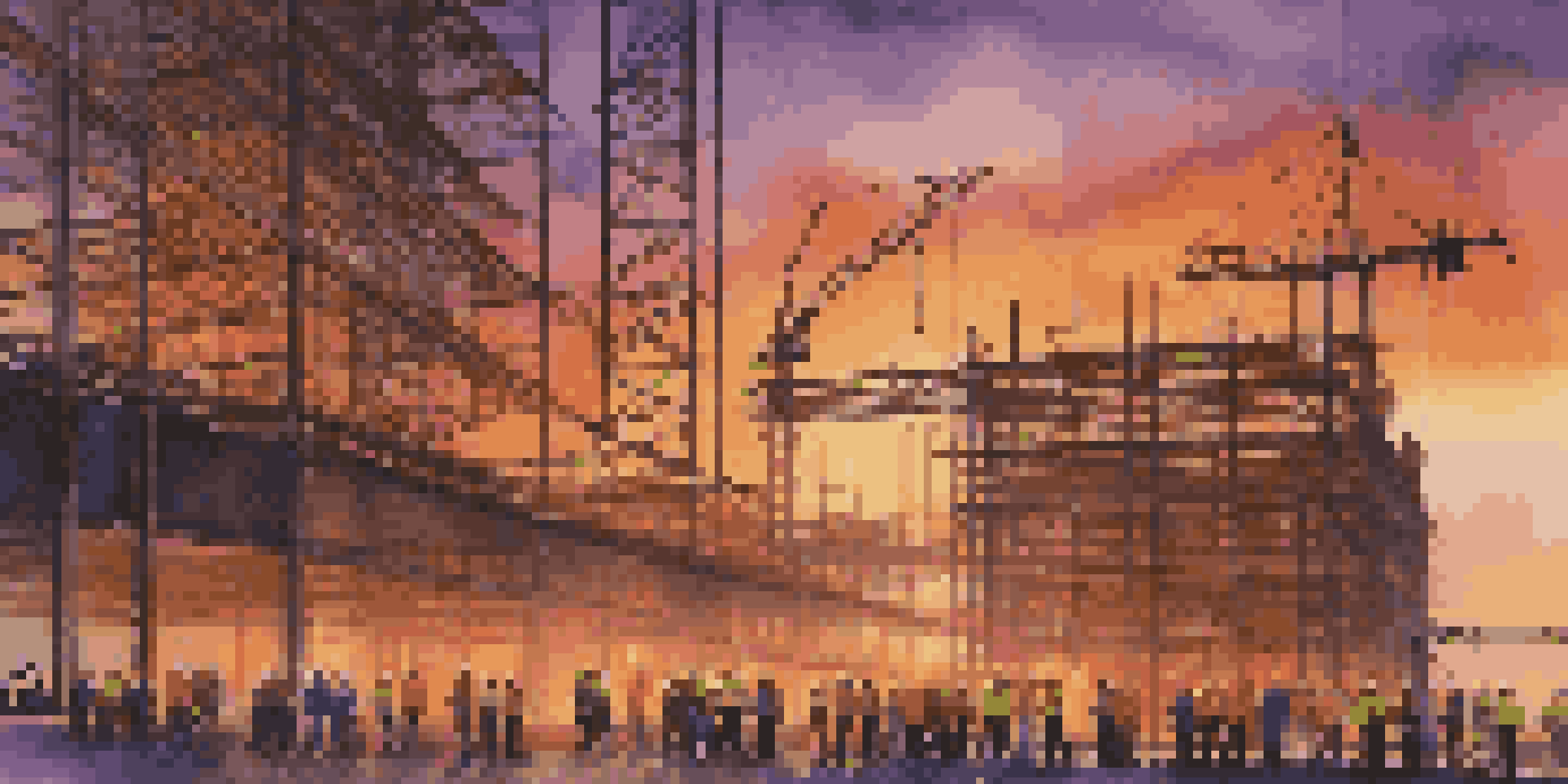 A diverse group of construction workers wearing colorful PPE at dusk, with scaffolding and cranes in the background.