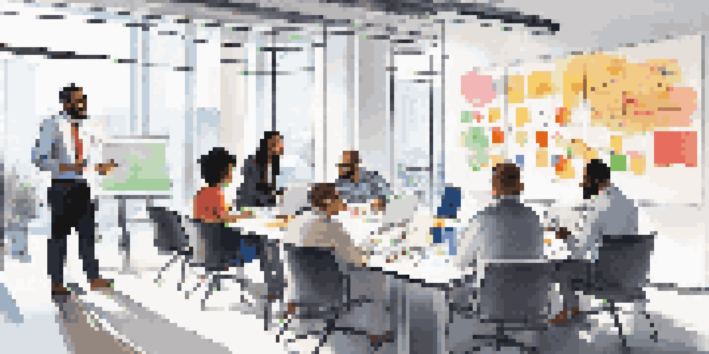 A diverse group of professionals in a bright modern office, collaborating in a meeting with a whiteboard full of notes.