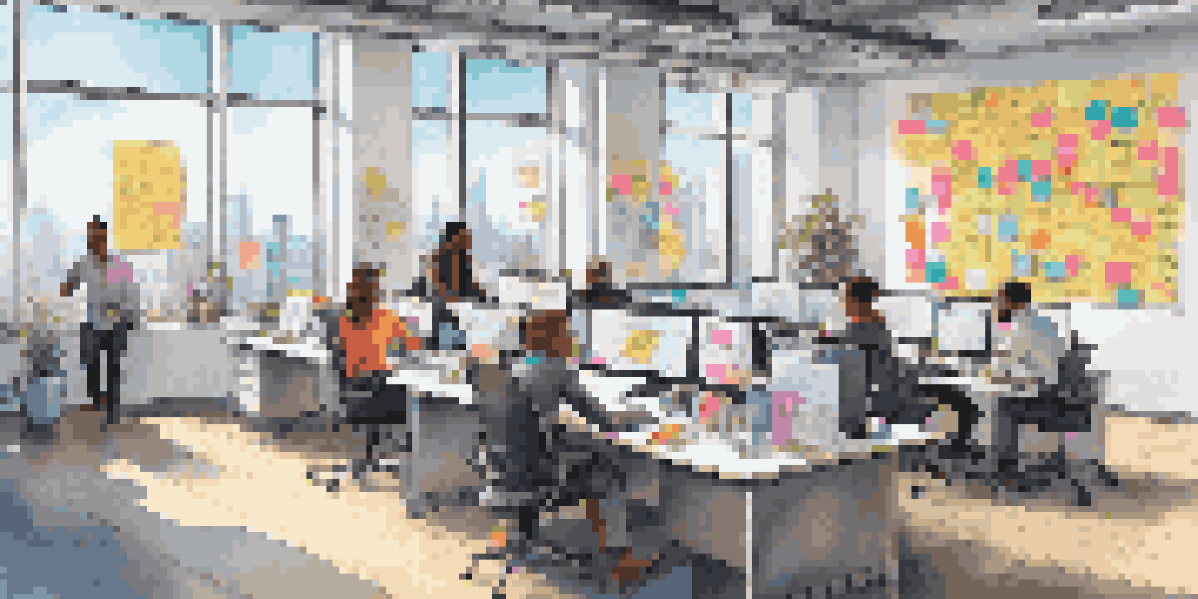 A bright and modern office with team members working together, surrounded by colorful notes and a view of the city.