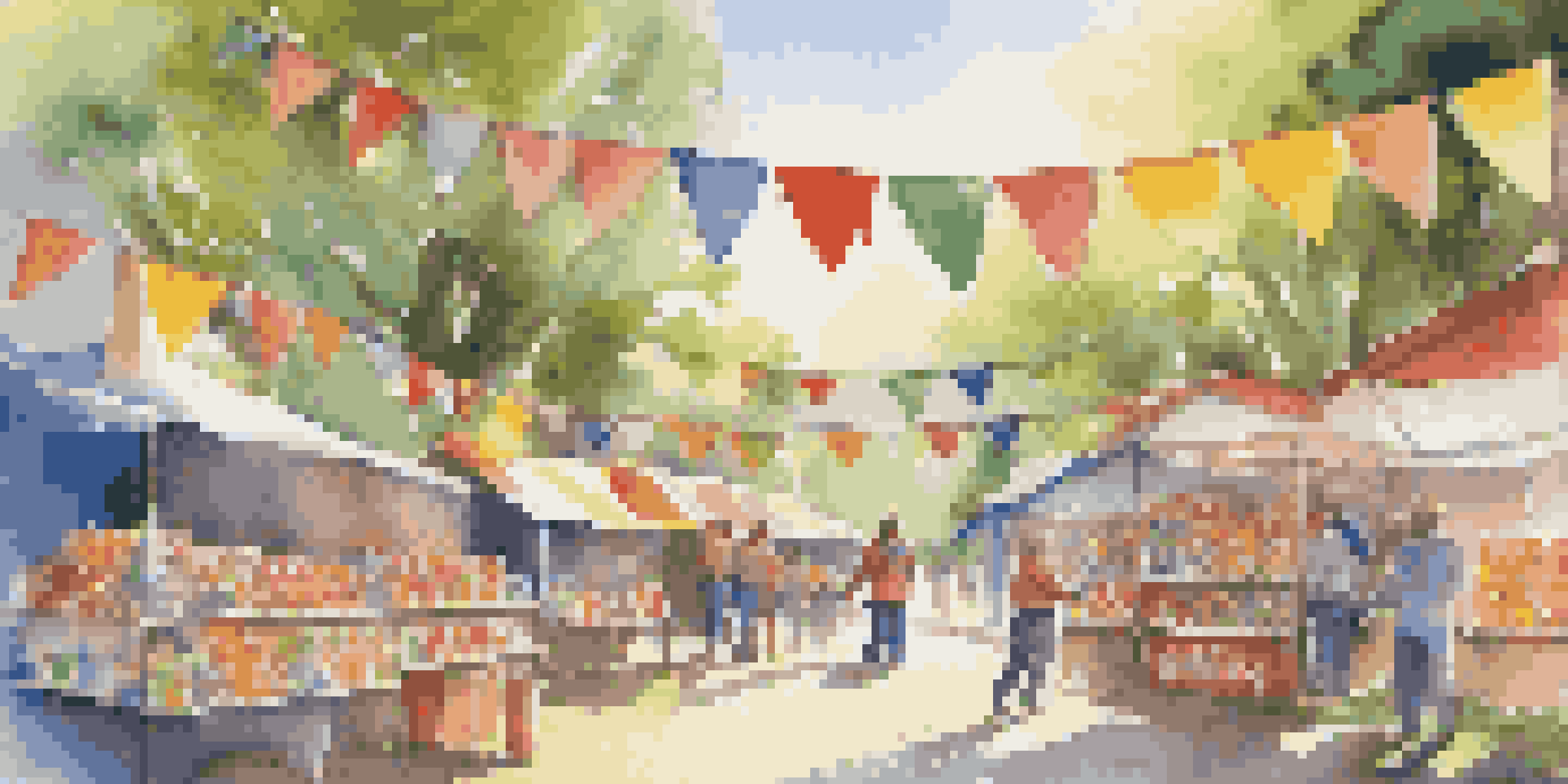 A volunteer organizing supplies for a charity event outdoors, surrounded by colorful banners and decorations.
