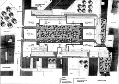a black and white plan of a large building with lots of trees .