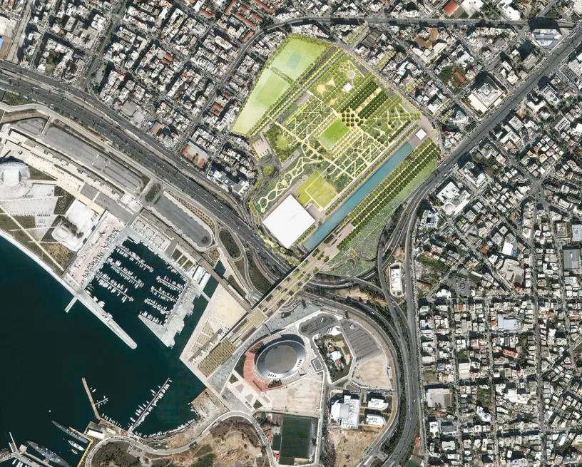 An aerial view of a city with a large park in the middle of it