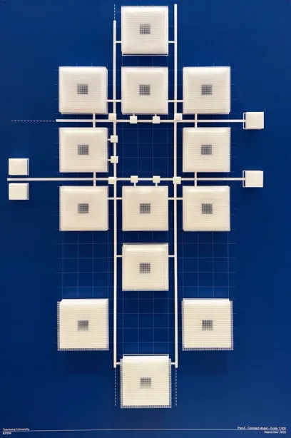 Architectural concept model showing white square modules with central dark grids, connected by white lines on a blue grid background.
