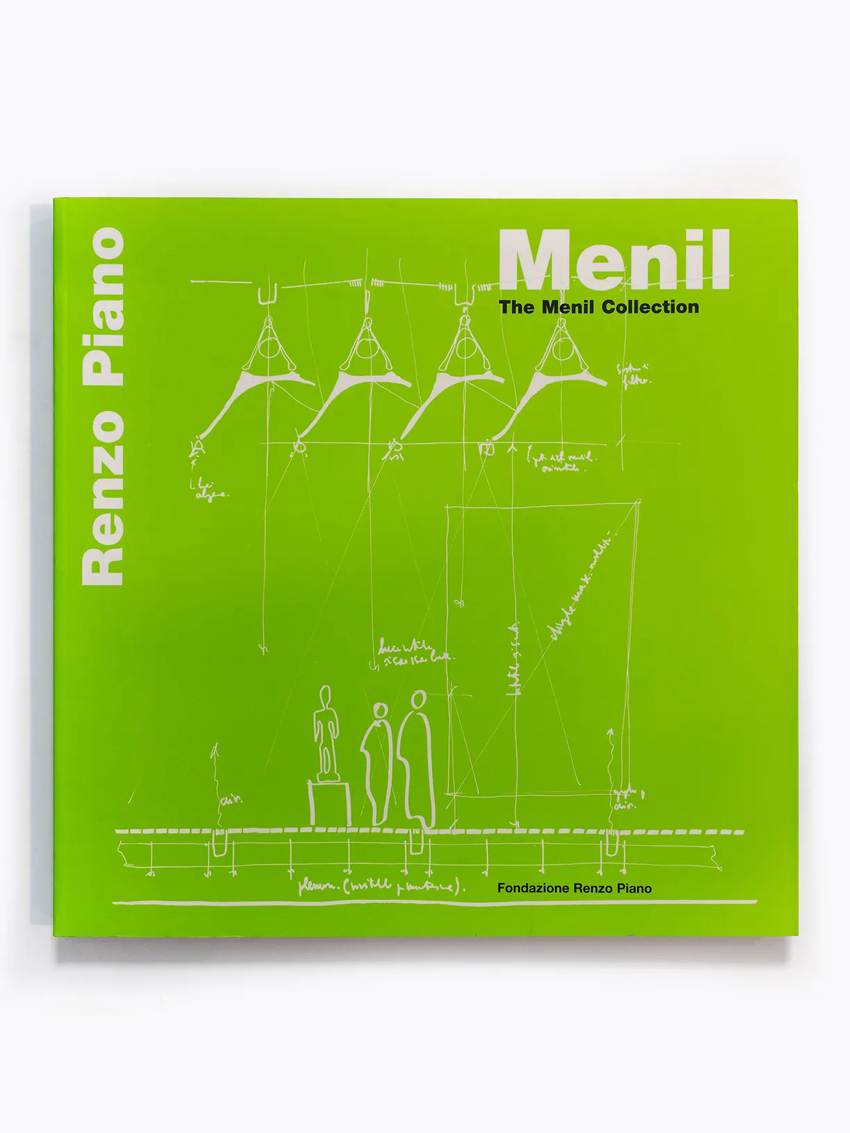 A green book titled the menil collection by renzo piano