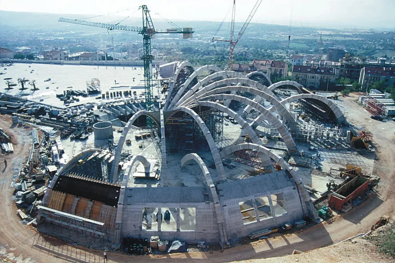 An aerial view of a large building under construction