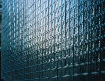 A large wall made of glass blocks on a building