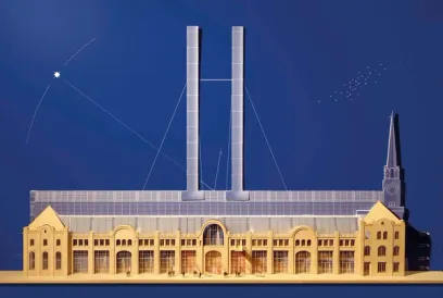 A model of a building with two towers and a church on a blue background