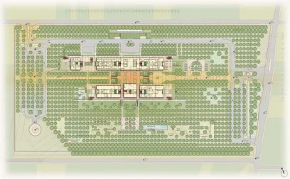 a floor plan of a large building surrounded by trees .