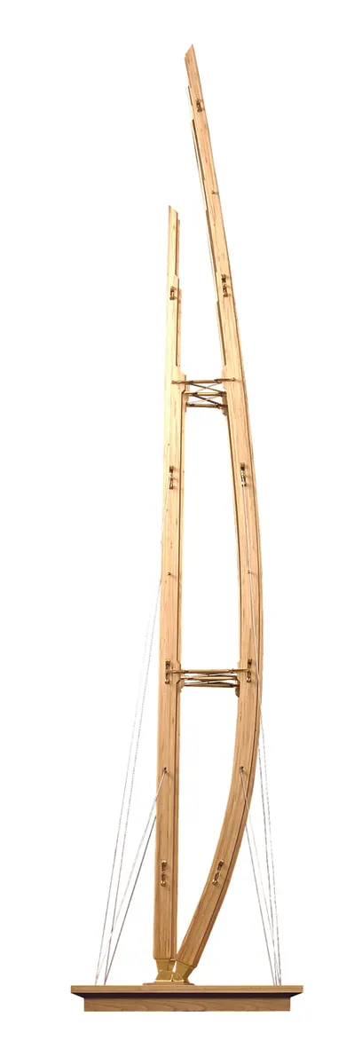 a wooden sculpture with the letter a on it