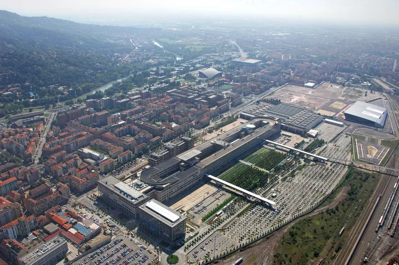 An aerial view of a large building in the middle of a city