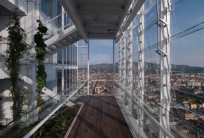 A very tall building with the letter w on it