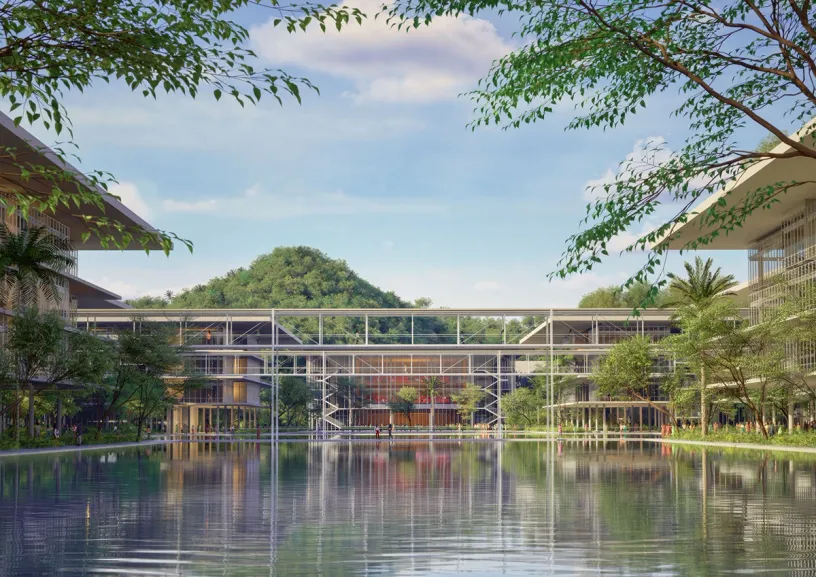 An artist 's impression of a large building surrounded by water and trees