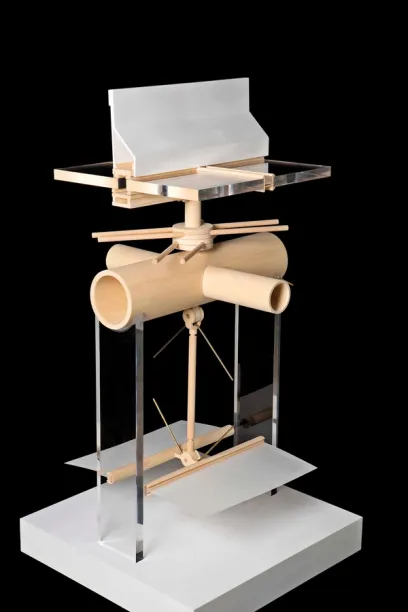 A model of a building made of wood and acrylic