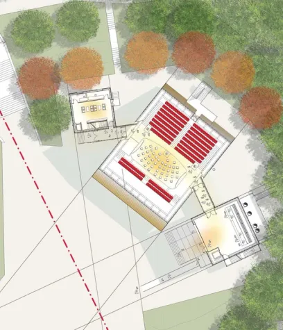 an aerial view of a building with a large auditorium in the middle