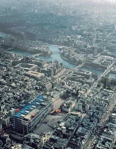 An aerial view of a city with a river running through it