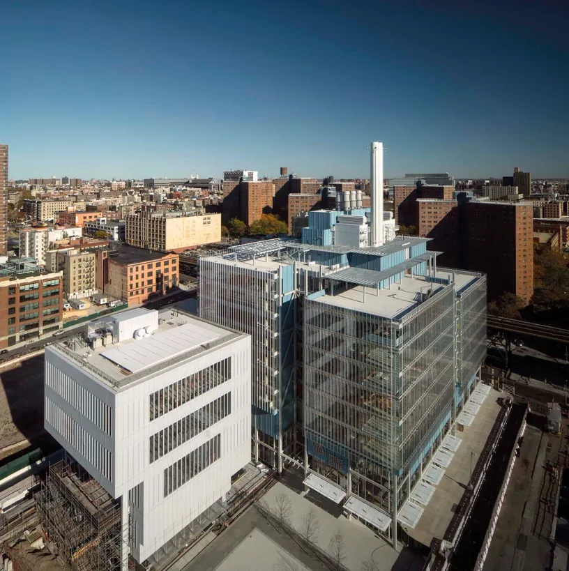 an aerial view of a large building in the middle of a city .