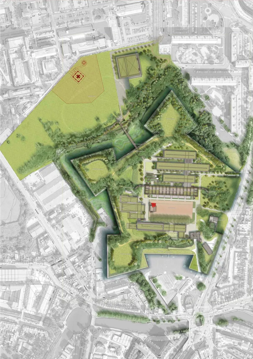 An aerial view of a city with a red cross in the middle