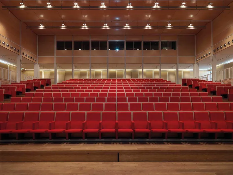 A black and white map of a city with buildings and trees