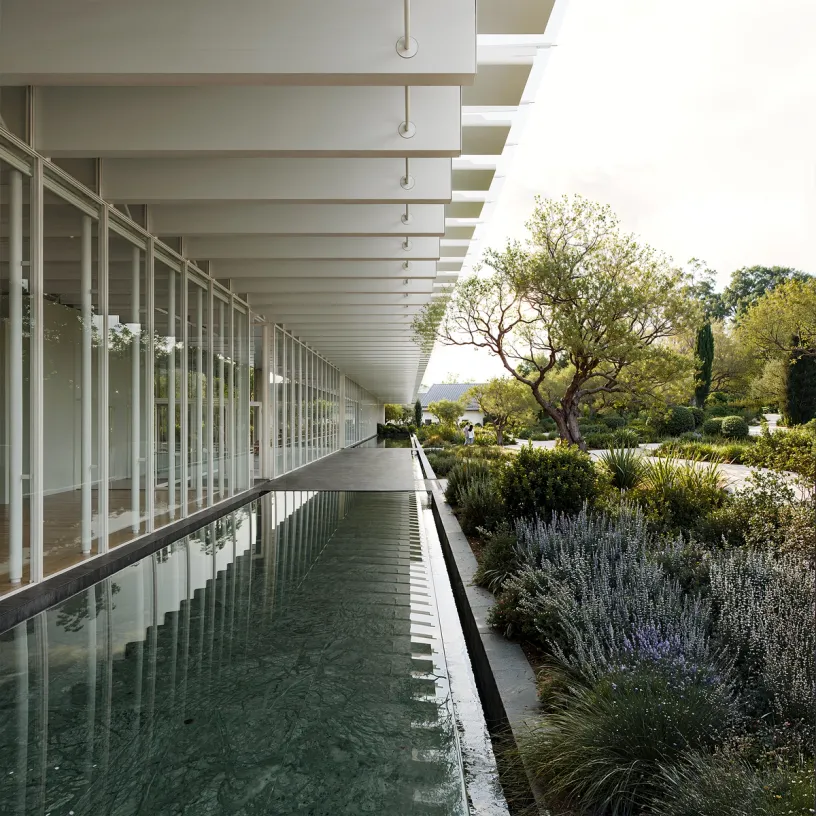 a drawing of a building with trees in the background