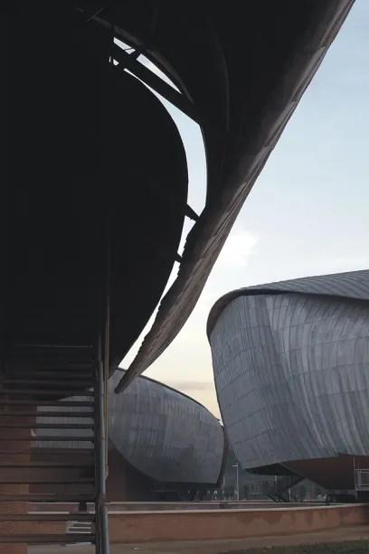 Stairs leading up to a building with a curved roof