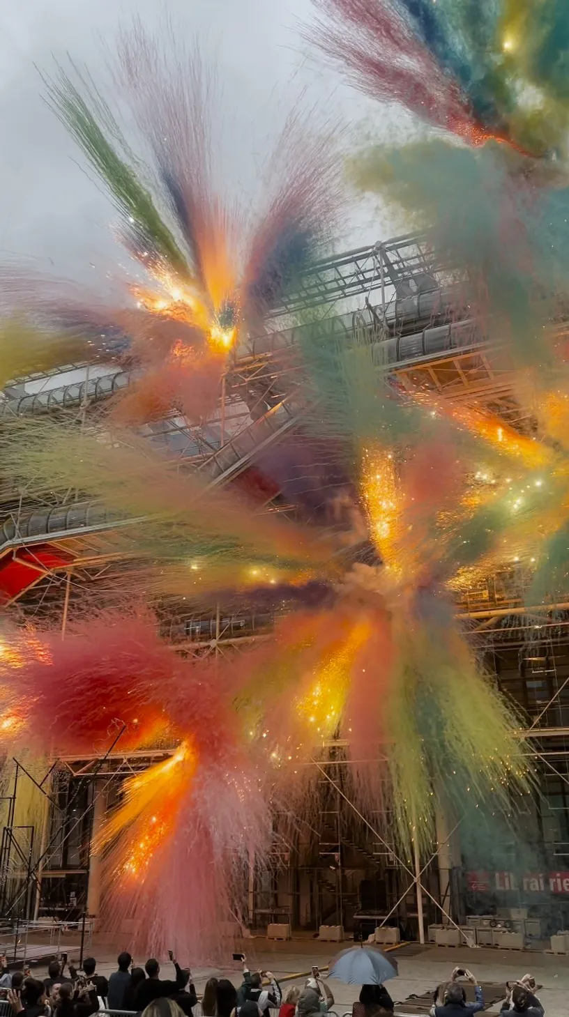 a group of people wearing hard hats and safety vests pose for a picture