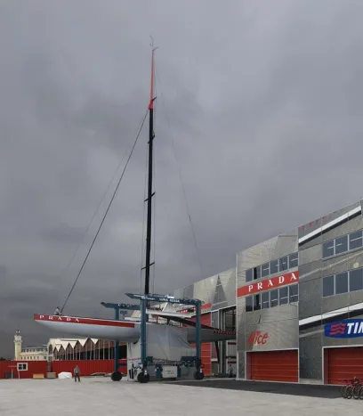 a prada building with a large sailboat in front of it