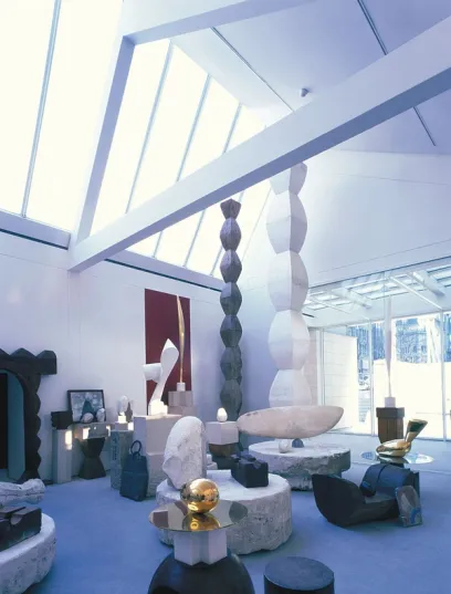 a room with a lot of sculptures in it