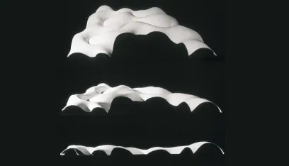 A black and white photo of a white object on a black background