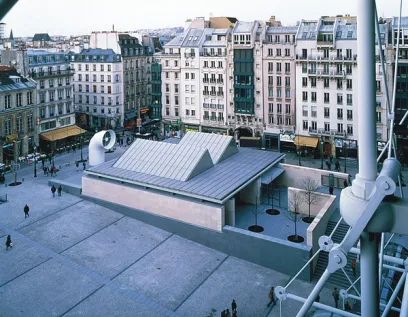 an aerial view of a building in the middle of a city .
