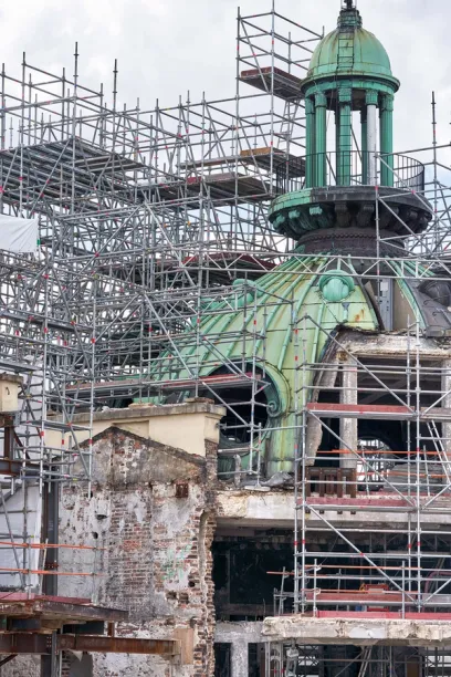 A building under construction with scaffolding around it