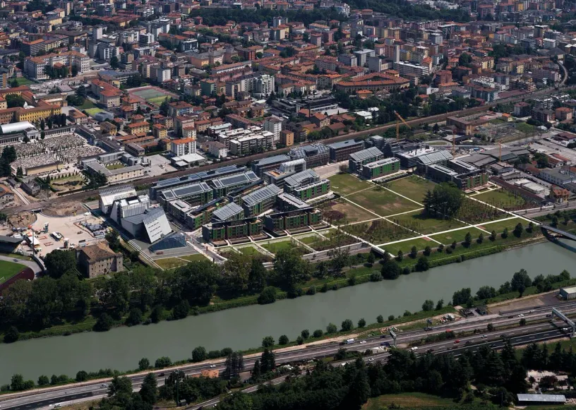 an aerial view of a city with a river running through it .
