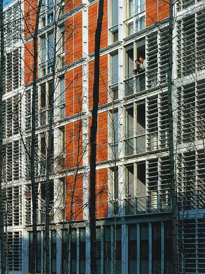looking up at the ceiling of a building with lots of windows