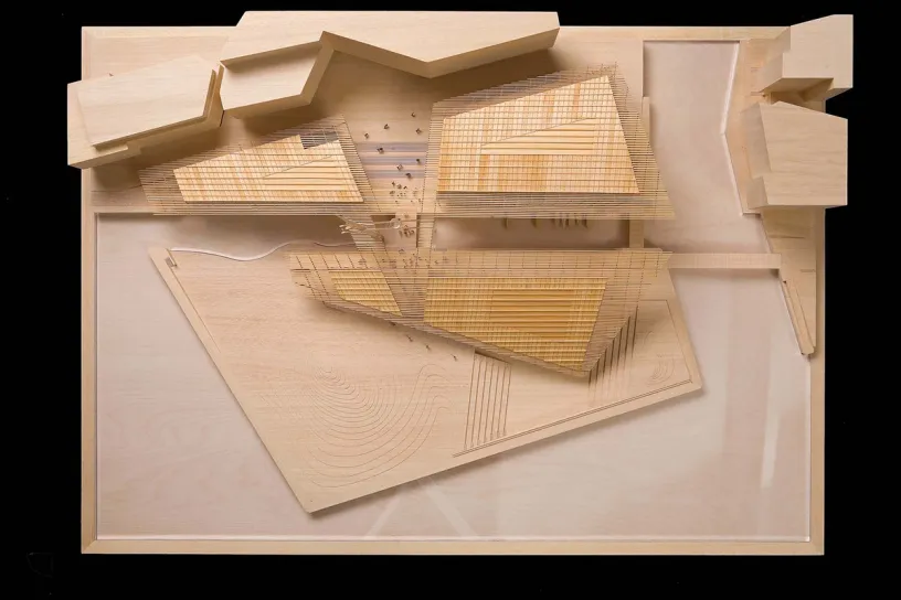 An aerial view of a wooden model of a building