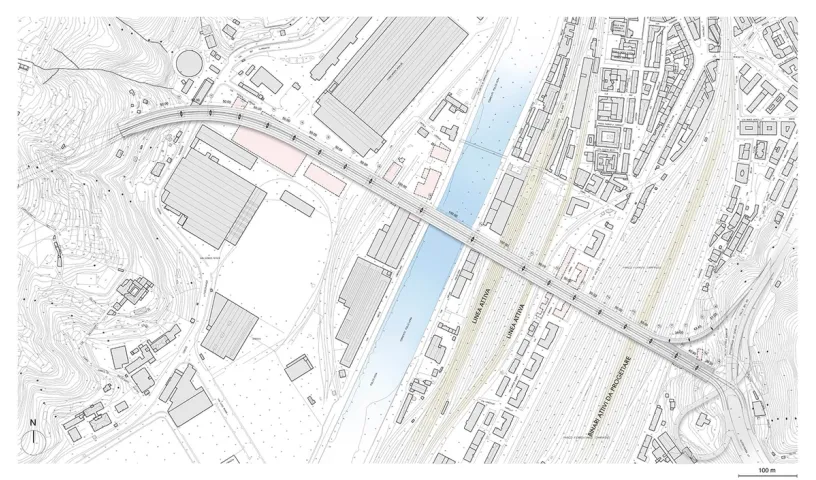 An aerial view of a bridge over a river in a city