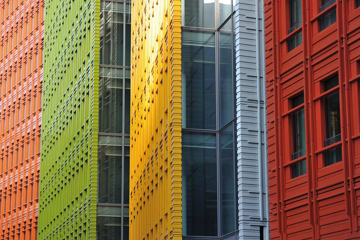 A close up of a colorful building with a lot of windows