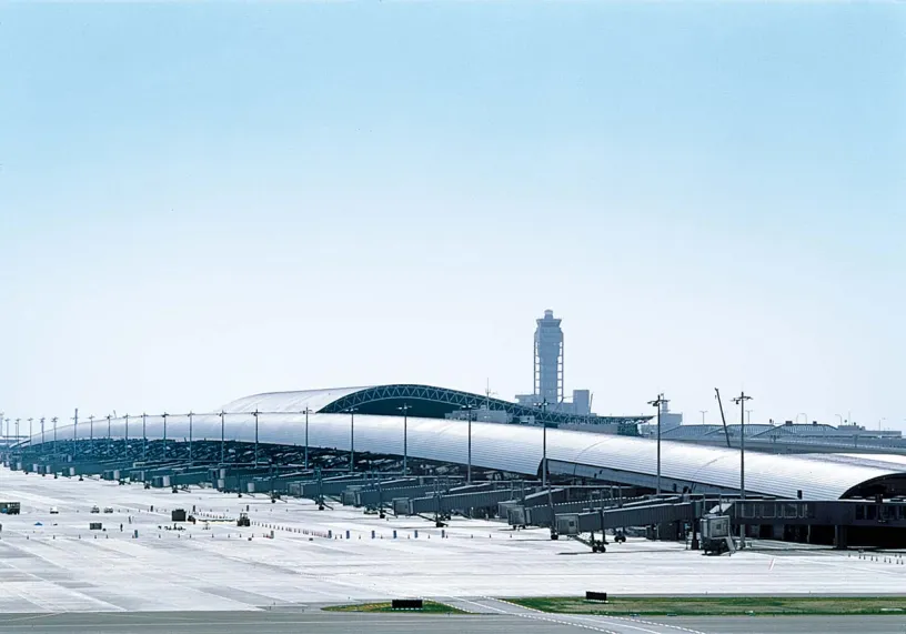 A large airport with a lot of planes parked on the tarmac